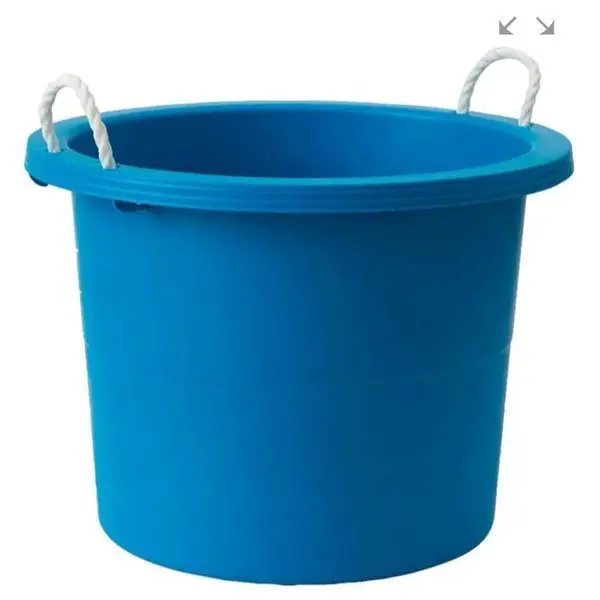 A blue bucket with two handles on top of it.